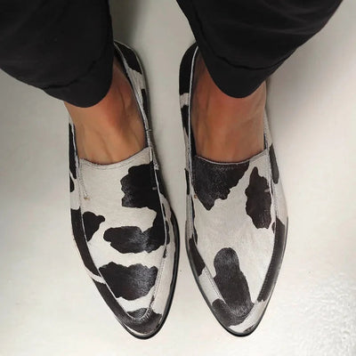 Cow Print Slip-Ons